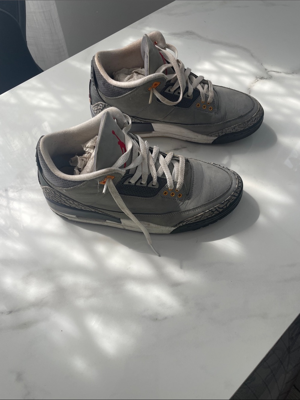Jordan Gray and Black Retro Sneakers with Red Tongue Logo